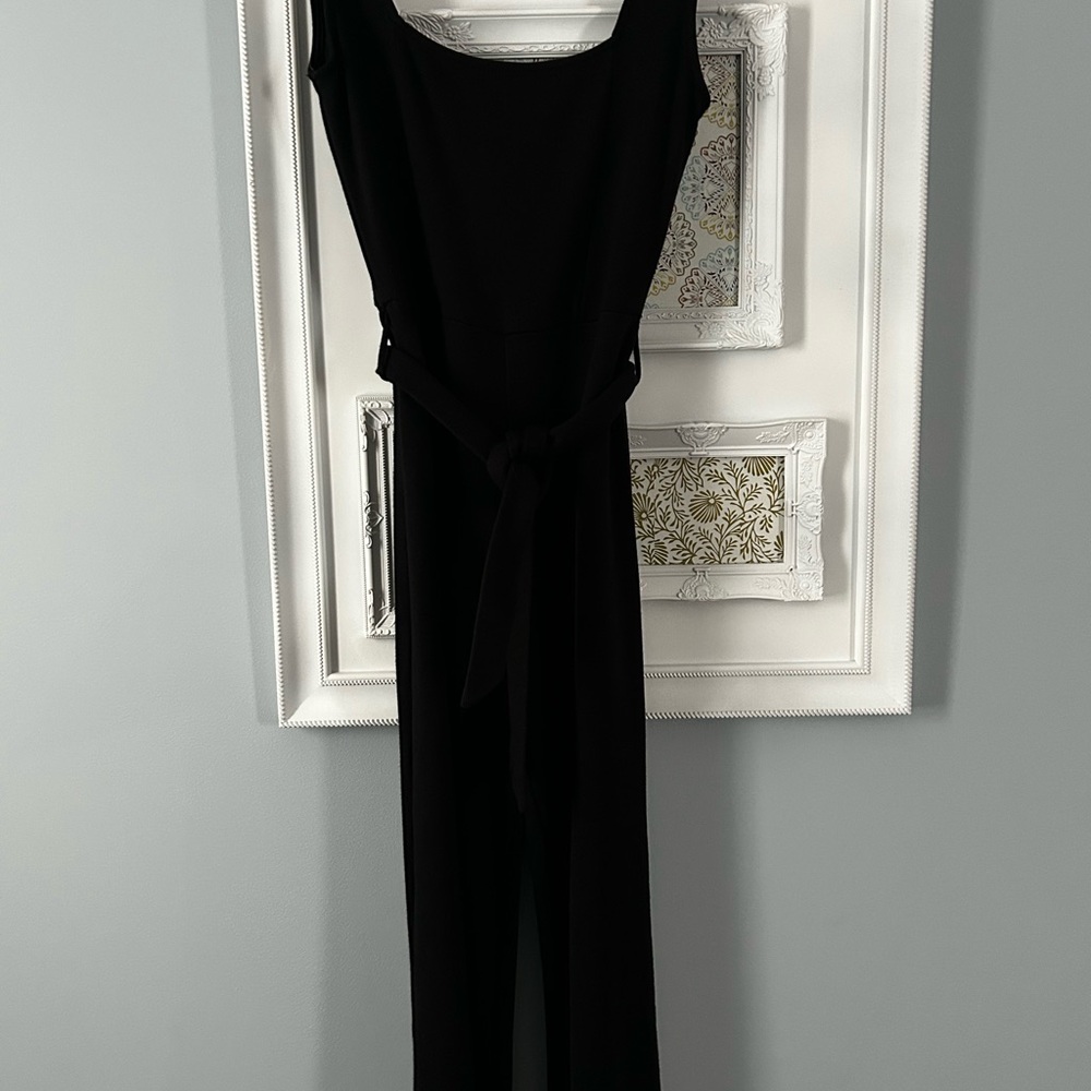 Rolla Coster Black Jumpsuit with High Neckline and Flared Legs